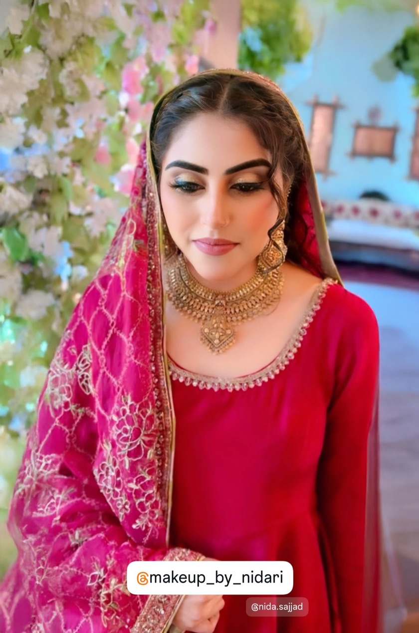 Rose pink bridal glam with floral garden backdrop by Makeup by Nidari, Houston